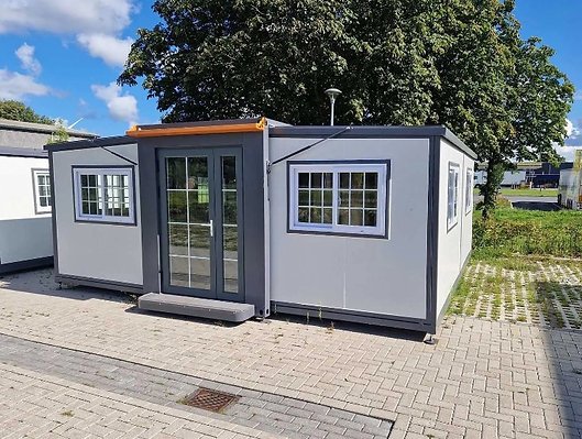 52aa76_bf708f5acde146f2a61e241ead969263mv2.jpg Mobiles Tiny House Deluxe (19x20ft) – 2023 – Bild 1